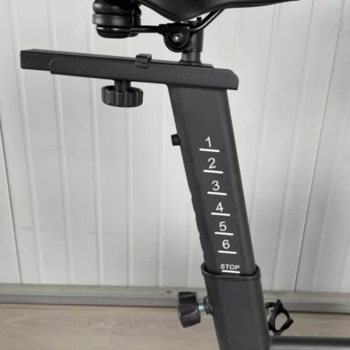 Spin Bike Seat Adjusting Hight Arror Mark